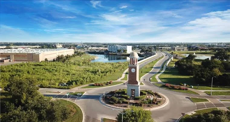 Cedar Park clock tower An aerial view of a clock tower and landscaped roundabout in Cedar Park, Texas.